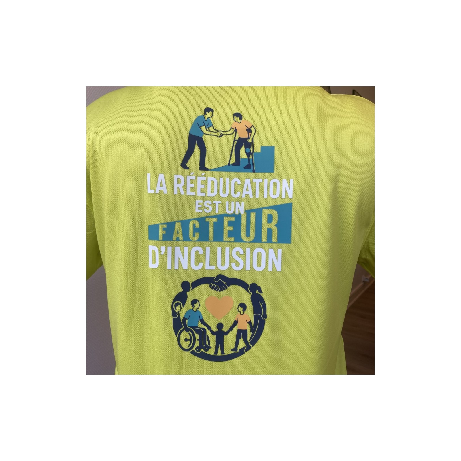 Tee-shirt Homme respirant citrus, marquage dos : La rééducation est un facteur d'inclusion.